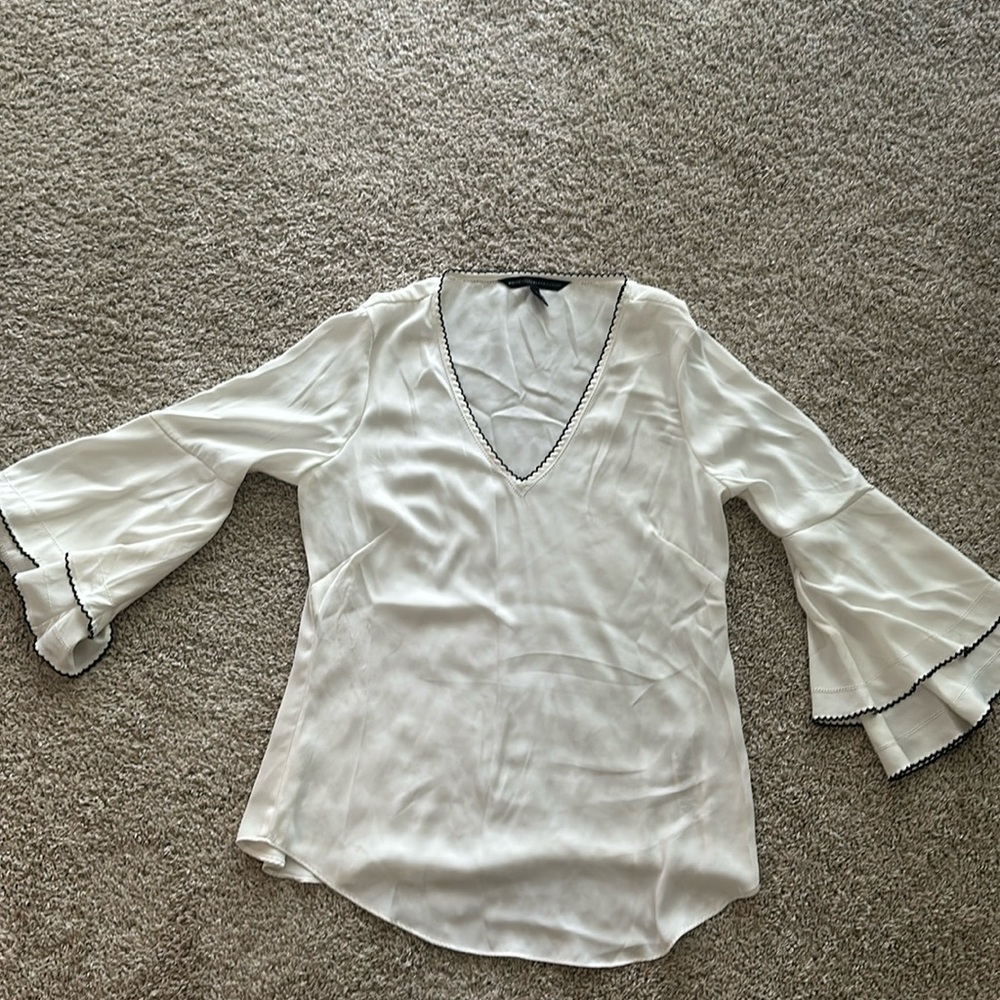 White blouse with flare sleeves